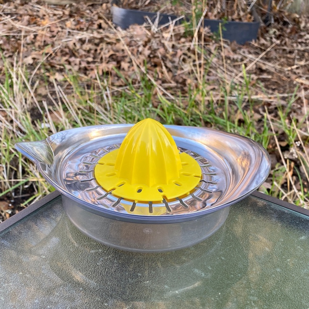 IKEA Yellow and Silver Citrus Juicer with measuring bowl